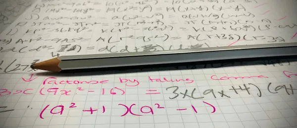 Maths equations written on paper